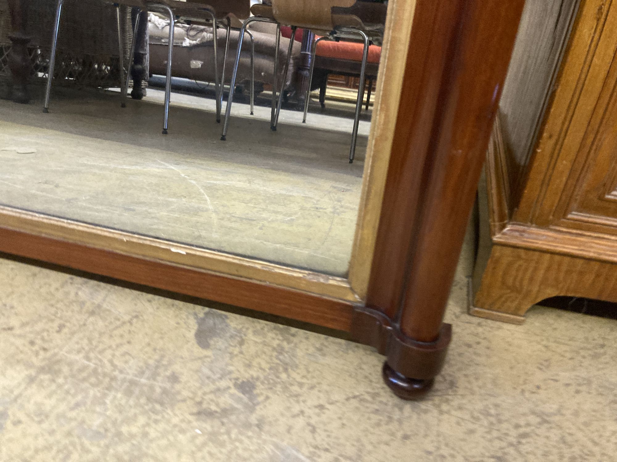 A Victorian mahogany overmantel mirror, width 102cm, height 71cm, together with a reproduction gilt framed overmantel mirror